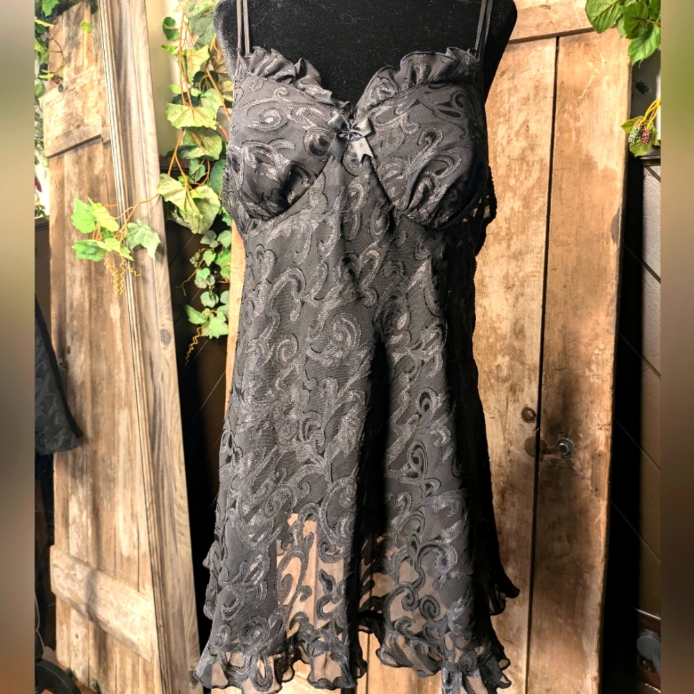 Black frilly nightgown.